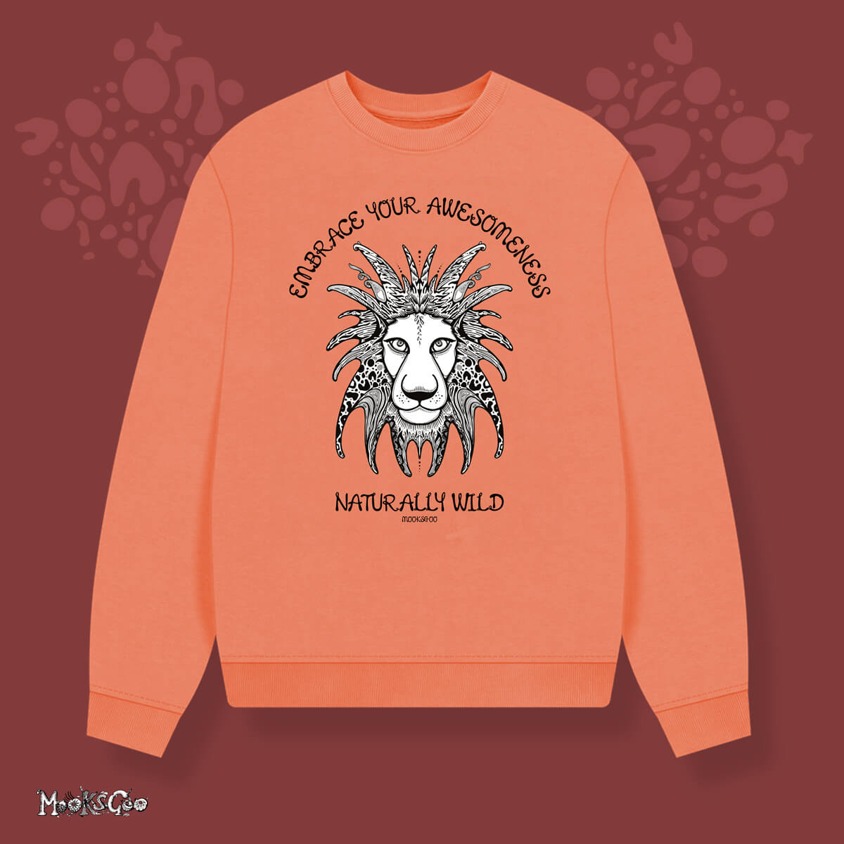 Apricot organic cotton oversized jumper, with the words Embrace Your Awesomeness, Naturally Wild fun typography. Black and white funky illustrated lion with bold patterns, designed by MooksGoo