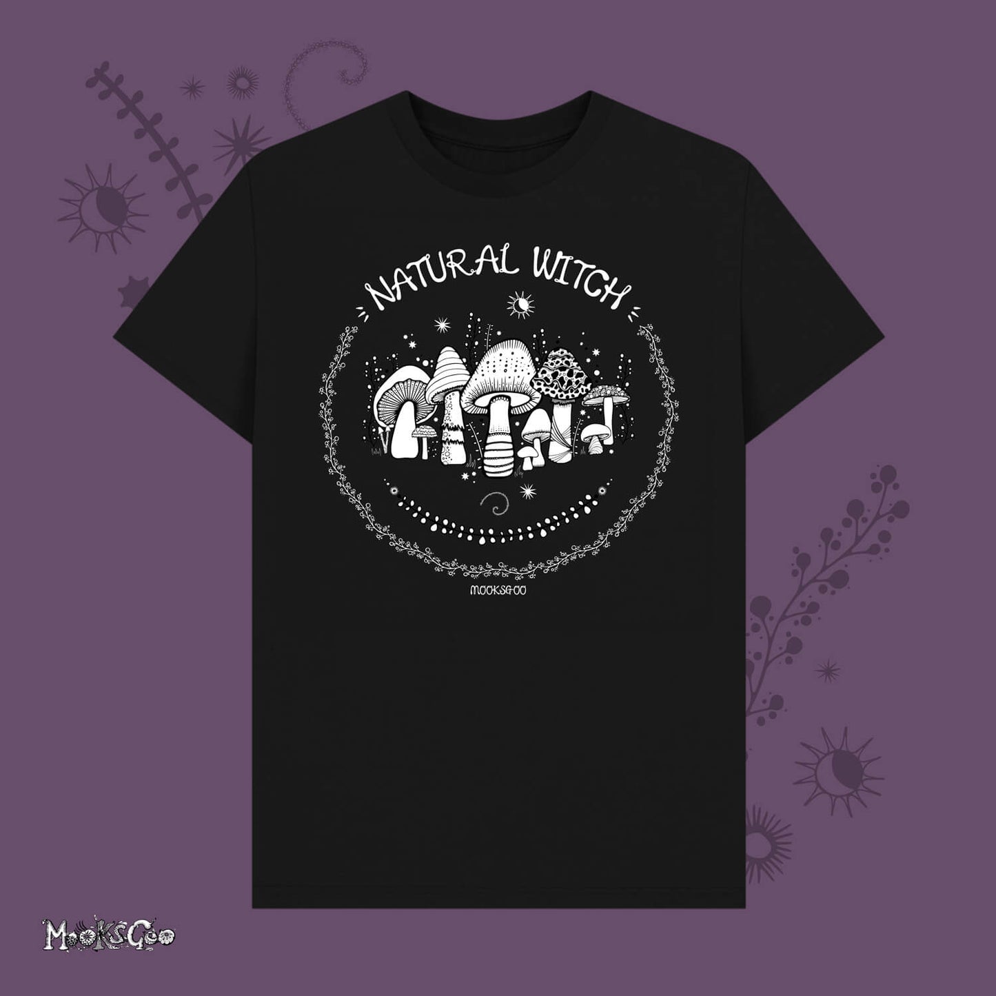 black unisex t-shirt with white illustrations of mushrooms, toadstools, moons, stars, leaves and vines, with the words Natural Witch in funky typography, halloween spooky design by MooksGoo