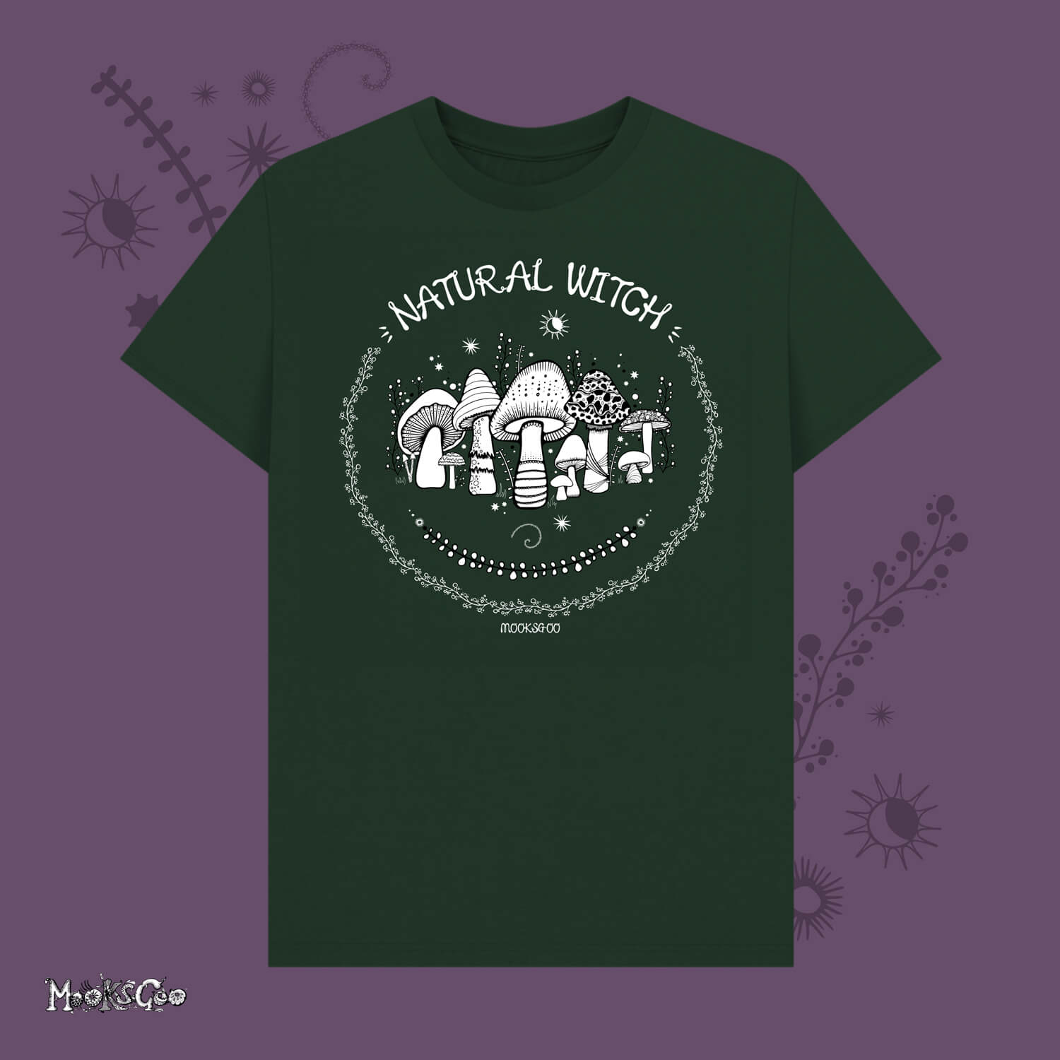 Dark evergreen unisex t-shirt with white illustrations of mushrooms, toadstools, moons, stars, leaves and vines, with the words Natural Witch in funky typography, halloween spooky design by MooksGoo