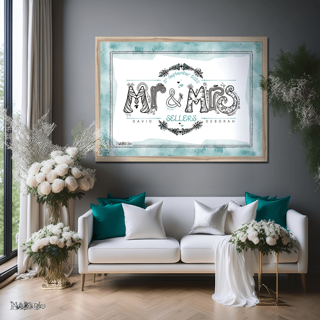 Mr and Mrs personalised print for a newly wed or engaged couple, in a large natural wooden frame in a room filled with teal cushions, white roses and a white sofa. Bespoke print designed by MooksGoo