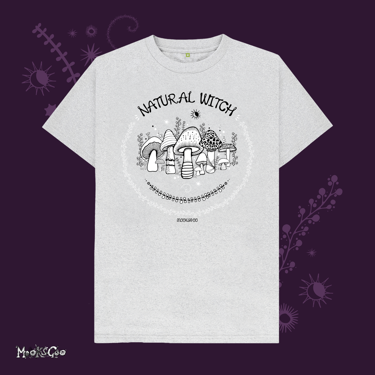 grey organic cotton recycled t-shirt with script typography fonts that says natural witch, with black and white illustrations of mushrooms, toadstools, leaves, sun and moon and stars, designed by MooksGoo