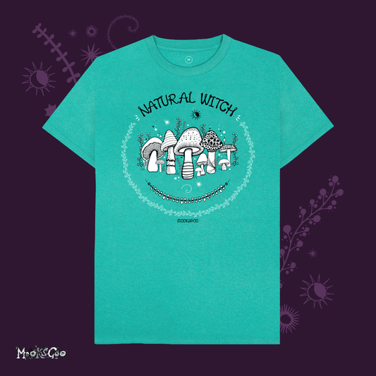 sea green organic cotton recycled t-shirt with script typography fonts that says natural witch, with black and white illustrations of mushrooms, toadstools, leaves, sun and moon and stars, designed by MooksGoo