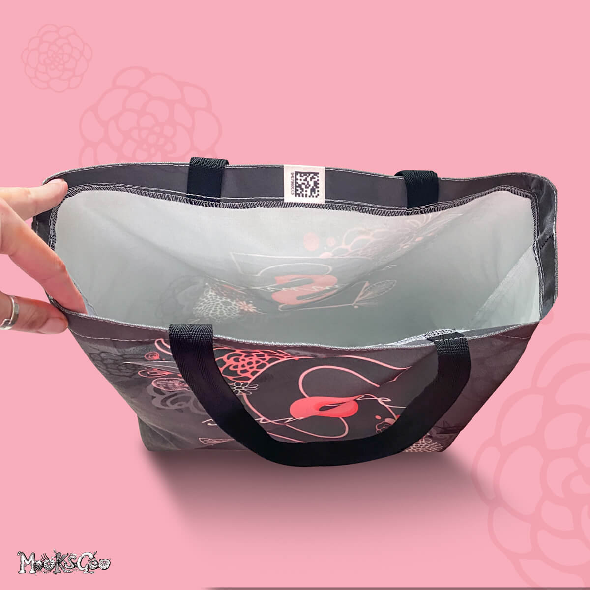 Open tote bag seeing the double sided design, created by MooksGoo