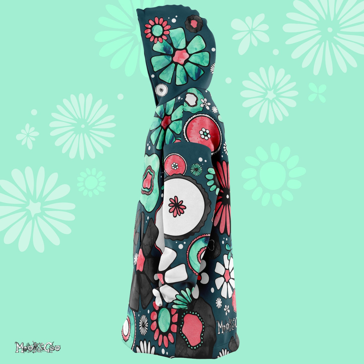 Side view of a big fat hoodie with colourful flowers illustrated by MooksGoo on an oversized cosy warm hoody with large hand drawn coral and turquoise flowers