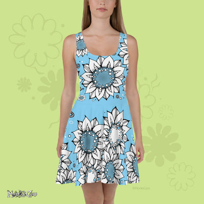 Front view of a Quirky and fun women's floaty light skater dress with hand drawn illustrated black and white sunflowers, dots and wheels, designed by MooksGoo