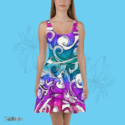 A female model facing the front, wearing a MooksGoo original designer dress, with illustrated surfing waves with rainbow colouring