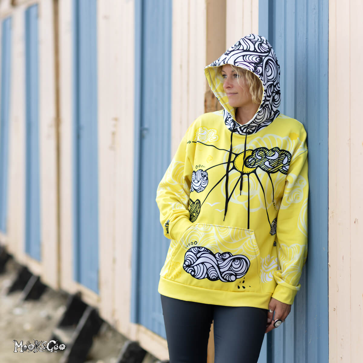 Funky and bright Sunny Sunshine recycled hoodie, with a yellow black and white design by MooksGoo. Modelled by Michelle Lott (MooksGoo) wearing a size L