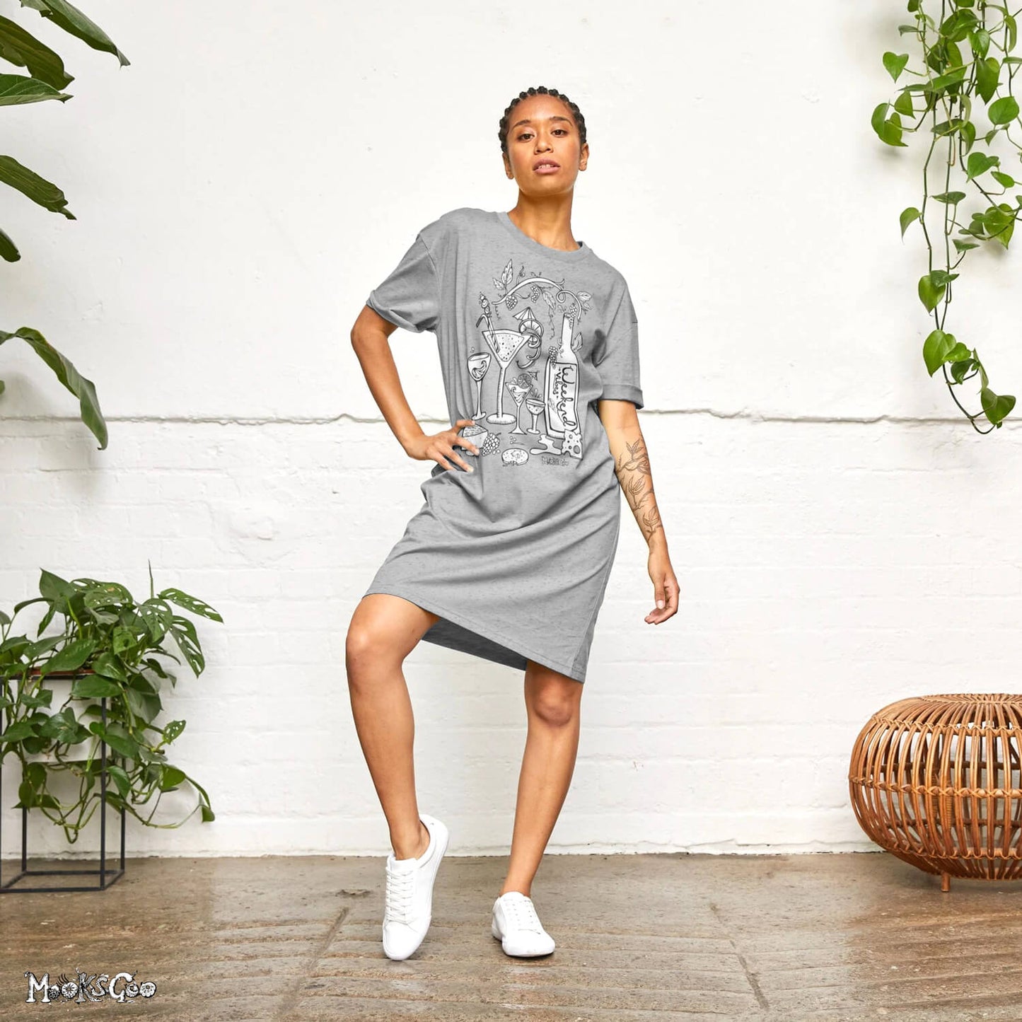 model showing off the athletic grey long t-shirt dress with a wine, cheese a biscuits theme, designed by MooksGoo 