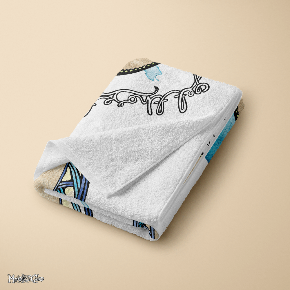 folded funky illustrated flip flop bath or beach towel with 'get those toes naked' and 'love summer' on the front, showing the details of the soft and absorbant towel, designed by MooksGoo.