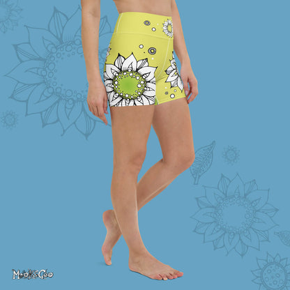 Funky lime green comfortable, super buttery soft yoga, workout, or cycling shorts, with bold black and white sunflowers, designed by MooksGoo. Model showing the right side of the shorts
