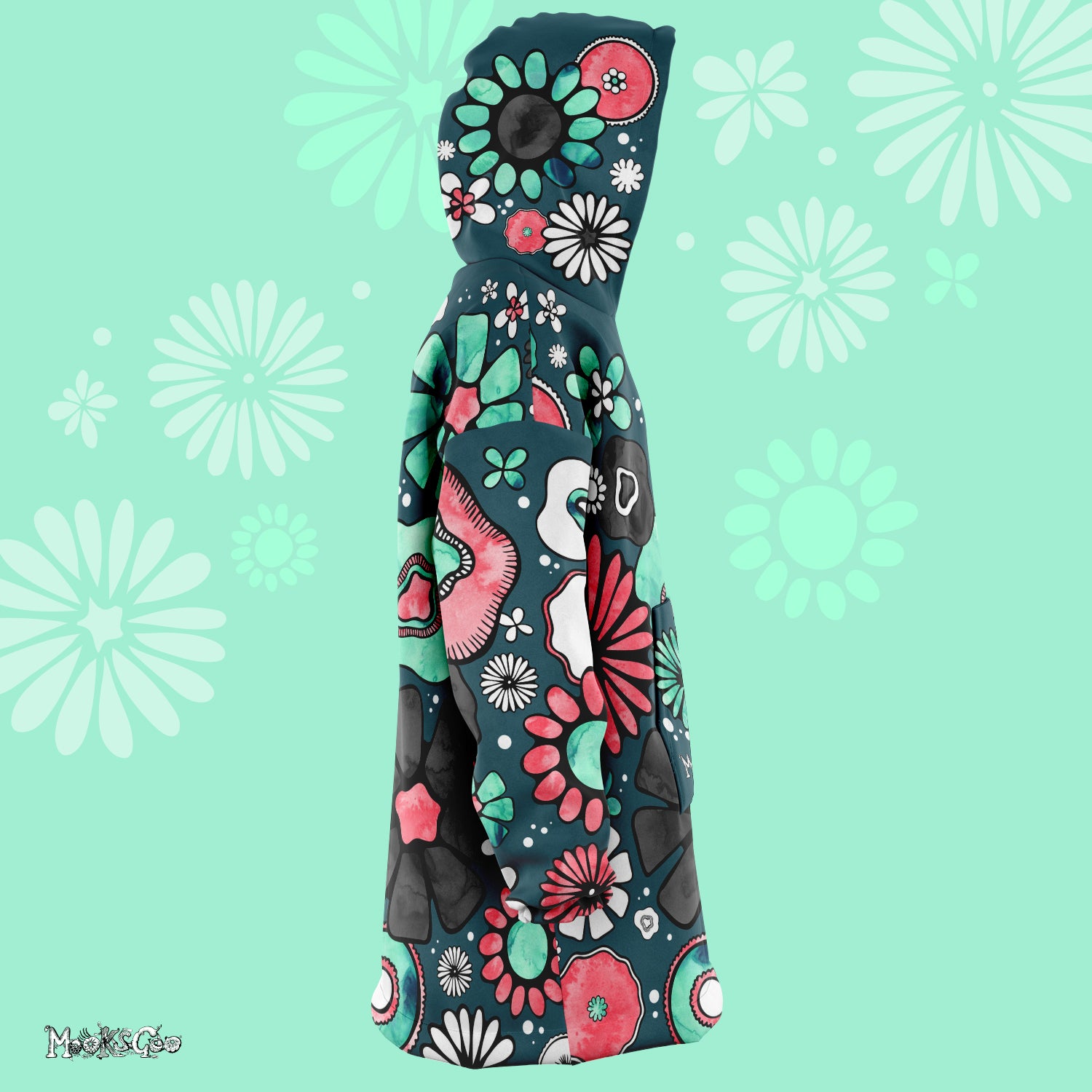 Side view of a big cushty hoodie with colourful flowers illustrated by MooksGoo on an oversized cosy warm hoody with large hand drawn coral and turquoise flowers